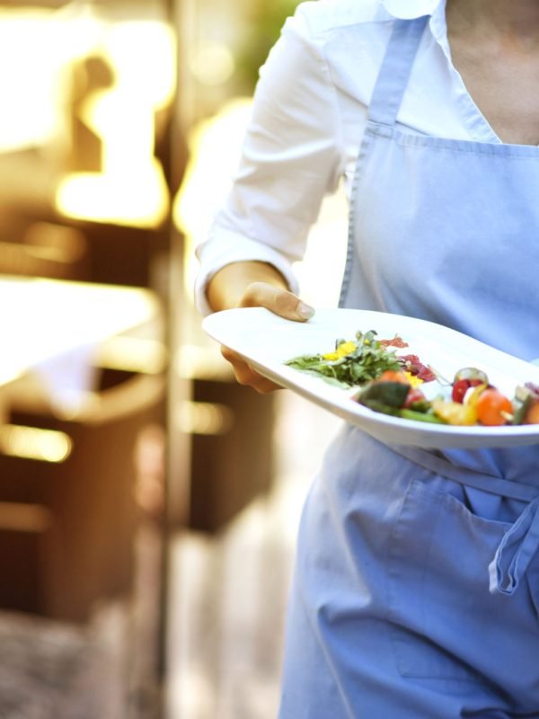 Waitress wears food at work in the restaurant